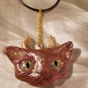 Horned Space Eyed Cat Red/Brown/Green/Gold Black Cord Necklace