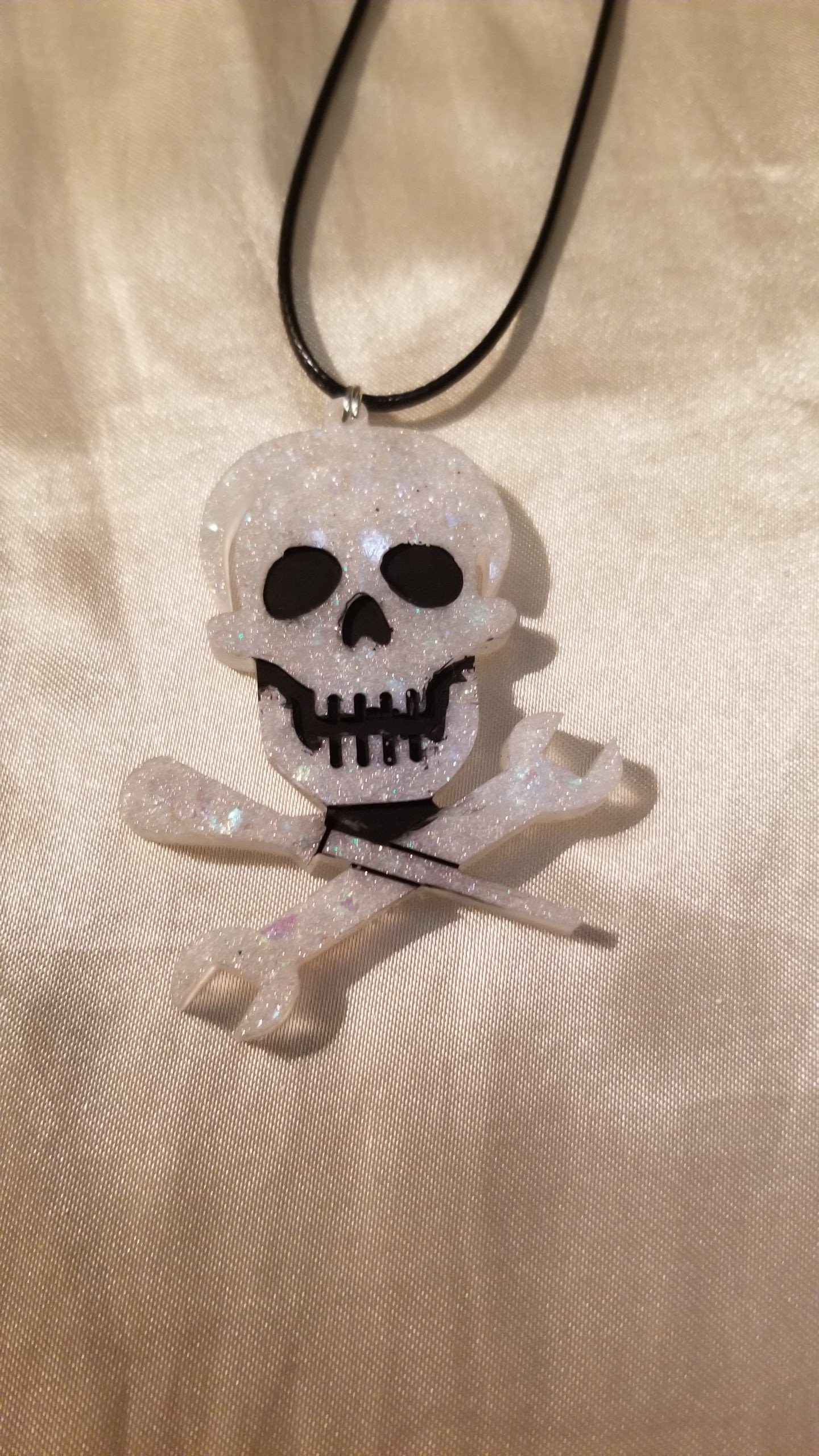 Skull & Tools White Glitter/Black Accents Black Cord Necklace