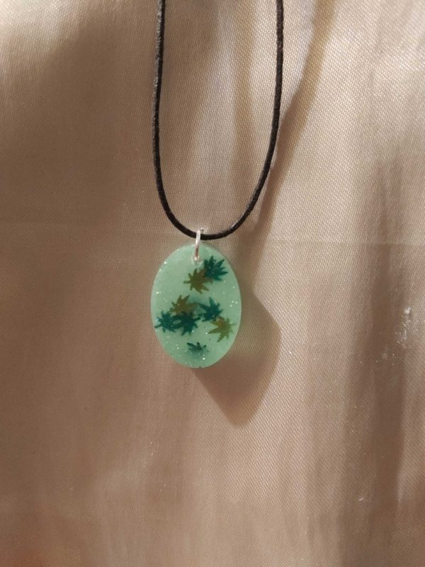 Oval 'High Maintenance' Glow-in-the-Dark 2-Tone Green Marijuana Leaf Glitter Black Cord Necklace