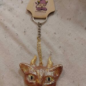 Horned Space Eyed Cat Red/Brown/Green/Gold Keychain
